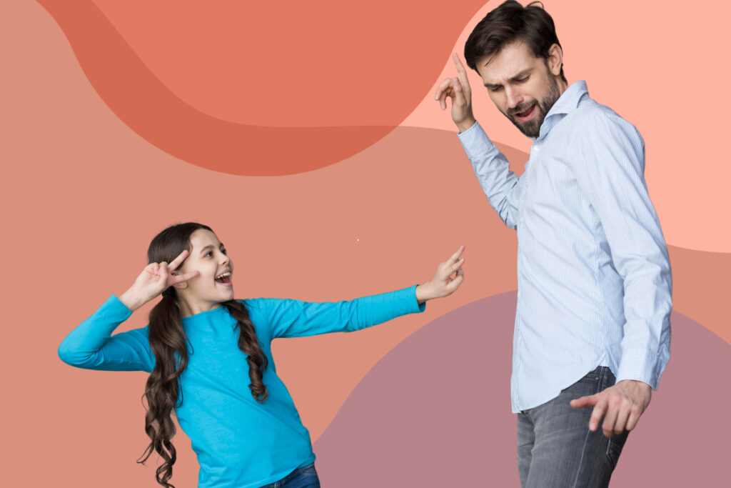 dad teaching girl dance