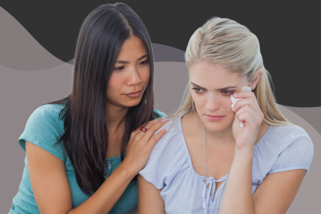 friend comforting her crying friend