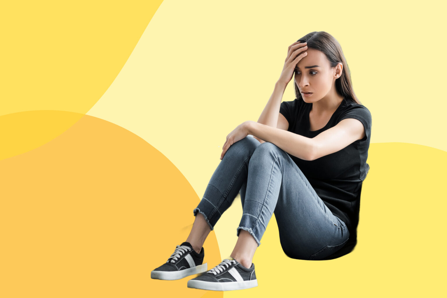 woman sitting on ground sad about attatchment issues