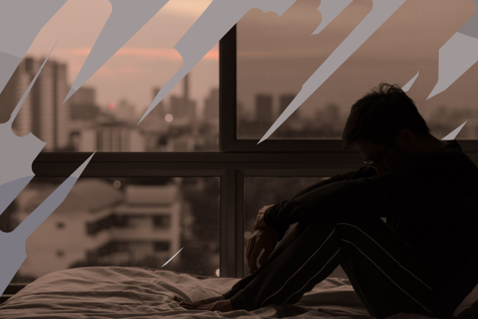 Traumatisme non résolu : 5 signes et causes man sitting in the dark