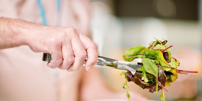 person serving salad