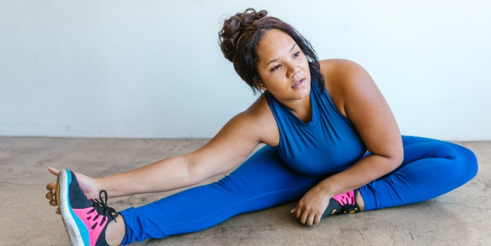 woman exercising indoors