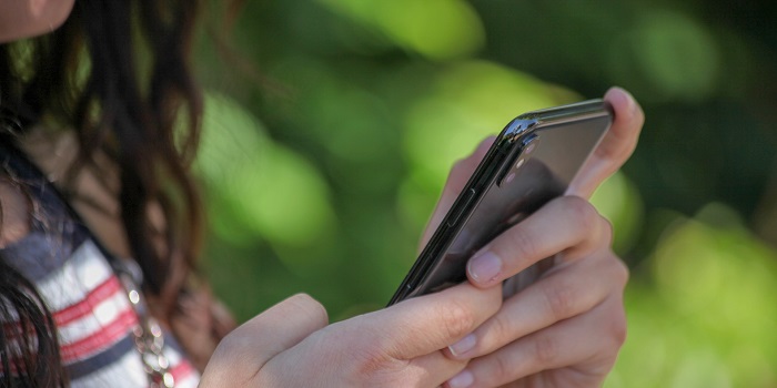 A girl using her phone