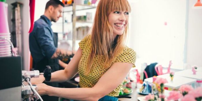 woman at an espresso machine