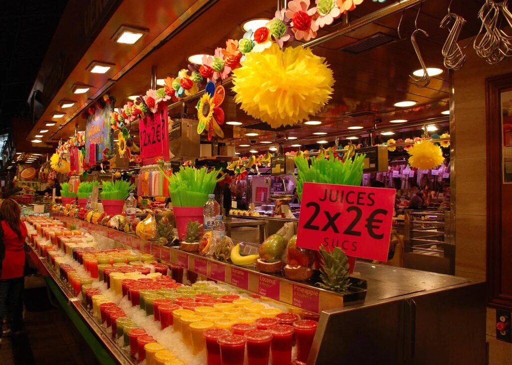 Colorful fruit stalls inside La Boqueria Market in Barcelona